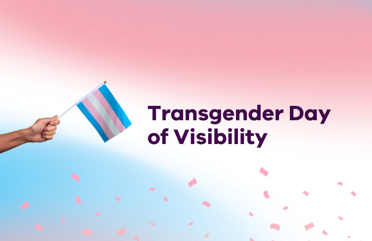 Hand with flag next to text that says Transgender Day of Visibility